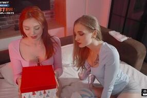 Eva Soda and her dolly friend take on Santa's big dick in a steamy New Year's fuck