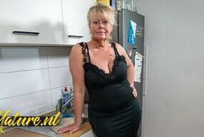 Watch Kiki Masturbate in the Kitchen with her Big Natural Tits and Busty Frame