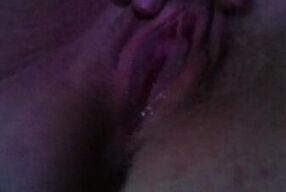 alone pussy drips wetness as fingers stroke it