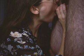 Gives a blowjob to his stepbrother and allows him to cum in his mouth.