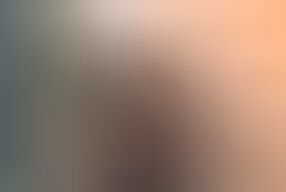 Busty Germans slut plays with a big orange dildo