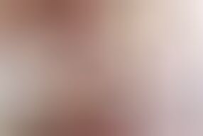 Big Breasted Mature Woman Rubs Her Unshaved Pussy in Bed