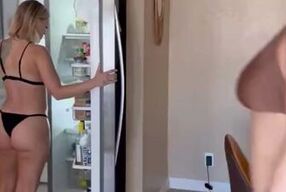 Licking her wet pussy in the fridge