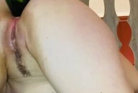 Peeing while fucking my tight little asshole with a Bottle