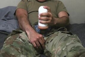 Soldier uses a fleshlight and creampies it