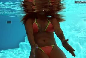 Anita rover enjoys a steamy solo underwater session with her perky tits and long hair